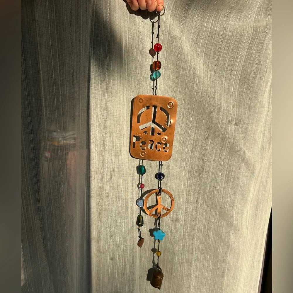 one of a kind peace wind chime